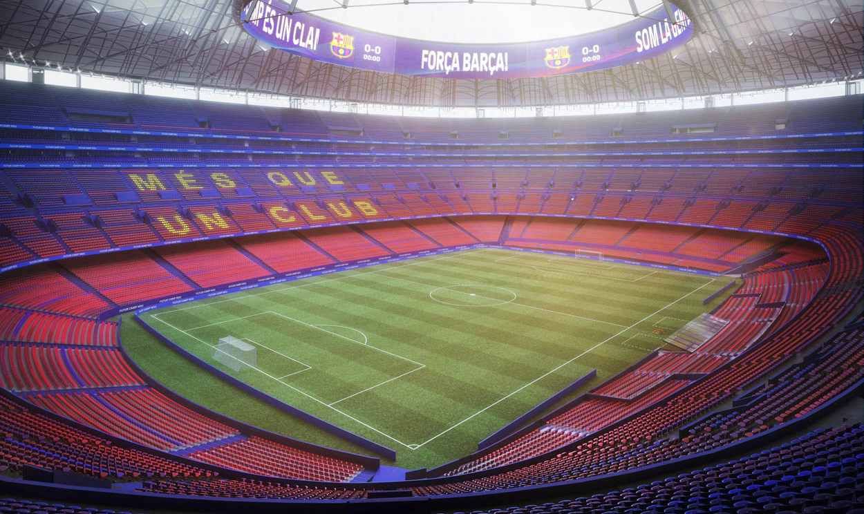 Interior do novo Camp Nou do FC Barcelona com arquibancadas e letreiro Més que un club